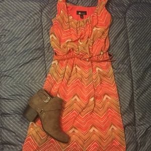 Belted Knee-length orange patterned dress